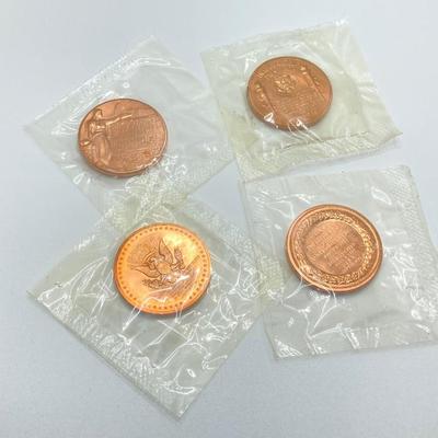 LOT 55: Four Bronze Inaugurated Presidential Medals / Tokens in Original Sealed Package - John F. Kennedy, James Garfield, Theodore...
