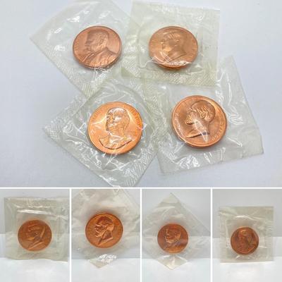 LOT 55: Four Bronze Inaugurated Presidential Medals / Tokens in Original Sealed Package - John F. Kennedy, James Garfield, Theodore...