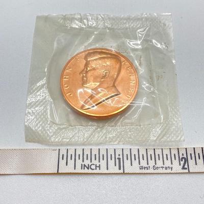 LOT 55: Four Bronze Inaugurated Presidential Medals / Tokens in Original Sealed Package - John F. Kennedy, James Garfield, Theodore...