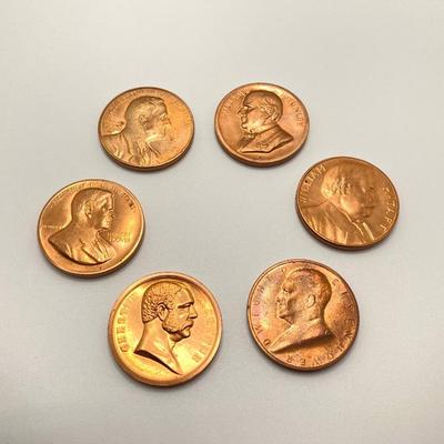 LOT 58: Eight Bronze Inaugurated Presidential Medals / Tokens in Large and Small Sizes (John F. Kennedy, Abraham Lincoln, Dwight D....