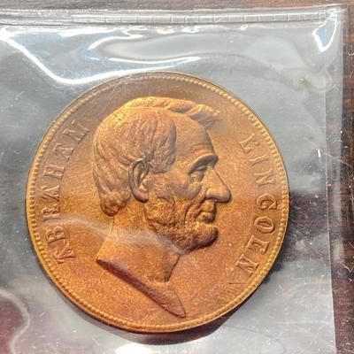 LOT 58: Eight Bronze Inaugurated Presidential Medals / Tokens in Large and Small Sizes (John F. Kennedy, Abraham Lincoln, Dwight D....