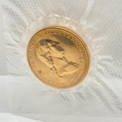 LOT 60: American Revolution Bicentennial Commemorative Medal, Four 2008-S Proof Presidential $1 Dollar Coins and 1979 Quarter Paper Weight