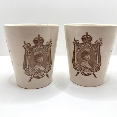 LOT 78: Pair of Antique 1911 Coronation Cups Featuring King George V and Queen Mary by Royal Doulton and Brass Prince Albert Brass Holder