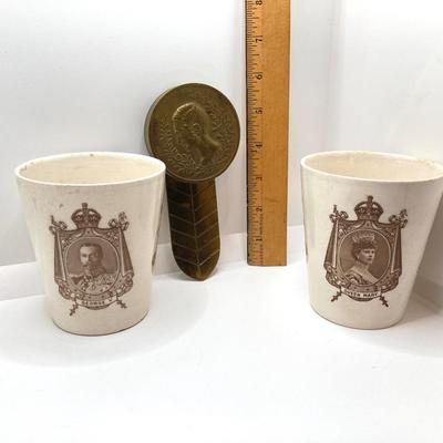 LOT 78: Pair of Antique 1911 Coronation Cups Featuring King George V and Queen Mary by Royal Doulton and Brass Prince Albert Brass Holder
