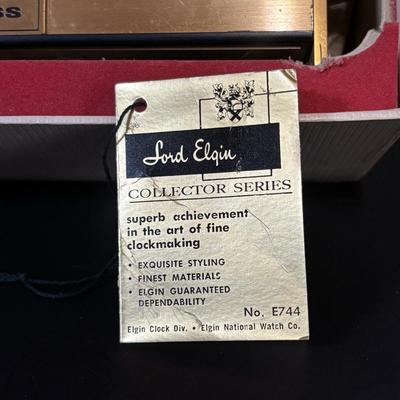 LOT 95: Vintage "American Express: Lord Elgin World Time Zone Brass Cabinet Table Clock