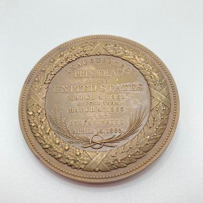 LOT 111: Five Bronze Presidential Medals / Tokens - George Washington with Wooden Stand and Three Abraham Lincoln and More