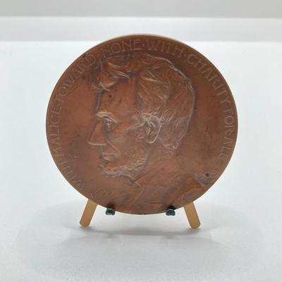 LOT 111: Five Bronze Presidential Medals / Tokens - George Washington with Wooden Stand and Three Abraham Lincoln and More