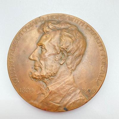 LOT 111: Five Bronze Presidential Medals / Tokens - George Washington with Wooden Stand and Three Abraham Lincoln and More