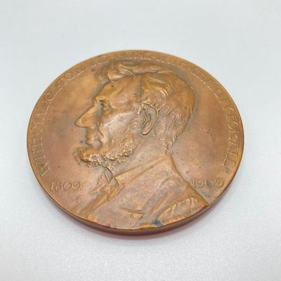 LOT 111: Five Bronze Presidential Medals / Tokens - George Washington with Wooden Stand and Three Abraham Lincoln and More