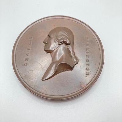 LOT 111: Five Bronze Presidential Medals / Tokens - George Washington with Wooden Stand and Three Abraham Lincoln and More