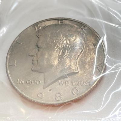 LOT 132: Four U.S. Mint Uncirculated Coin Sets in Original Envelopes - (2) 1980 and (2) 1981