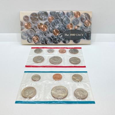 LOT 132: Four U.S. Mint Uncirculated Coin Sets in Original Envelopes - (2) 1980 and (2) 1981