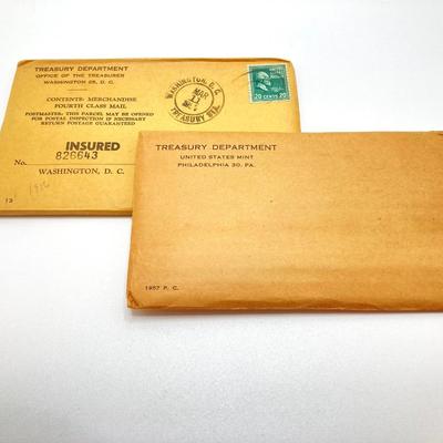 LOT 135: 1956 and 1957 U.S. Philadelphia Mint Coin Proof Sets sealed Original Envelopes