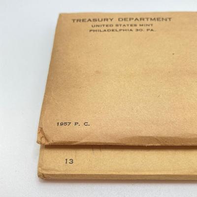 LOT 135: 1956 and 1957 U.S. Philadelphia Mint Coin Proof Sets sealed Original Envelopes