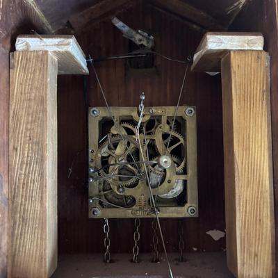 LOT 146: Vintage G.K. Cuckoo Clock with "Portrait" Pendulum