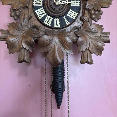 LOT 146: Vintage G.K. Cuckoo Clock with "Portrait" Pendulum