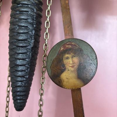 LOT 146: Vintage G.K. Cuckoo Clock with "Portrait" Pendulum