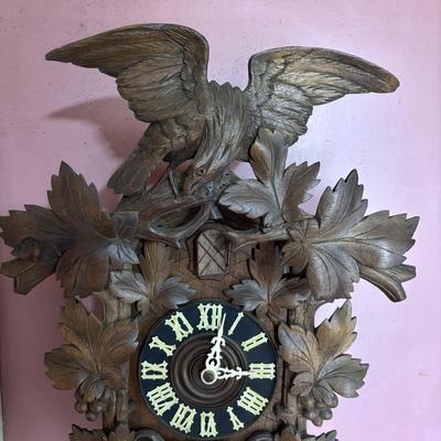 LOT 146: Vintage G.K. Cuckoo Clock with "Portrait" Pendulum