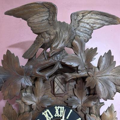 LOT 146: Vintage G.K. Cuckoo Clock with "Portrait" Pendulum