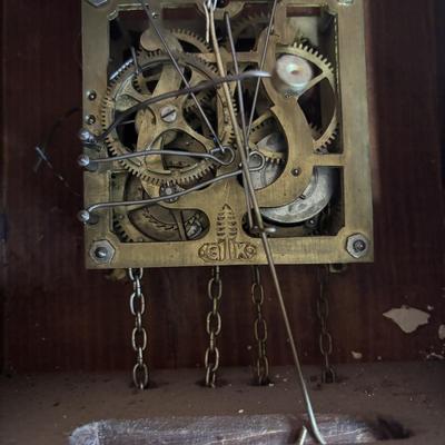 LOT 146: Vintage G.K. Cuckoo Clock with "Portrait" Pendulum