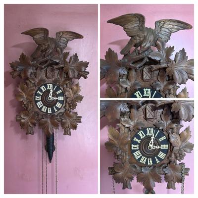 LOT 146: Vintage G.K. Cuckoo Clock with "Portrait" Pendulum