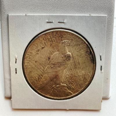 LOT 244: Collection of Six U.S. Silver Peace Dollar Coins - Dated 1924 and 1935