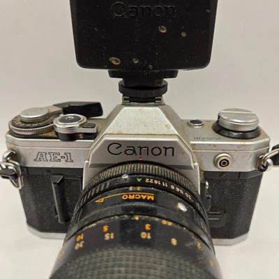 LOT 163F: Vintage Cannon AE-1 Camera with Hoya 67mm Lens