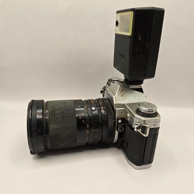 LOT 163F: Vintage Cannon AE-1 Camera with Hoya 67mm Lens