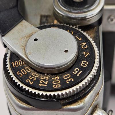 LOT 163F: Vintage Cannon AE-1 Camera with Hoya 67mm Lens