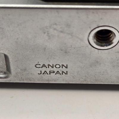 LOT 163F: Vintage Cannon AE-1 Camera with Hoya 67mm Lens