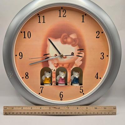 LOT 205D: Meow!! Hello Kitty Clock, 2 Vintage Possible Dreams Lady Ashley Cats, Lauren Marems Figurine, 2 Metal Tea Lite Candle...