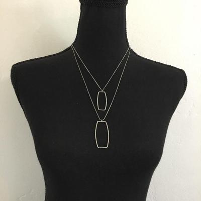 1946 layered silver, toned fashion necklace