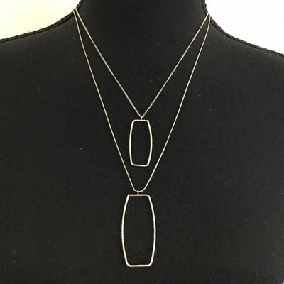 1946 layered silver, toned fashion necklace