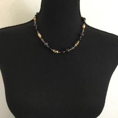 Worthington. Gold toned beaded necklace.