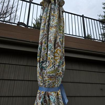 Like new crank style umbrella with umbrella stand