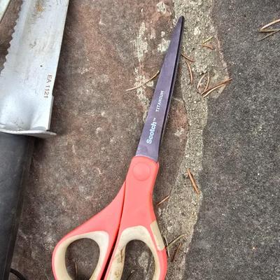 Gardening items - Vegetable seeds in a wire basket - Knee pad - Jars with gardening items - Garden knife - Hand rake and more