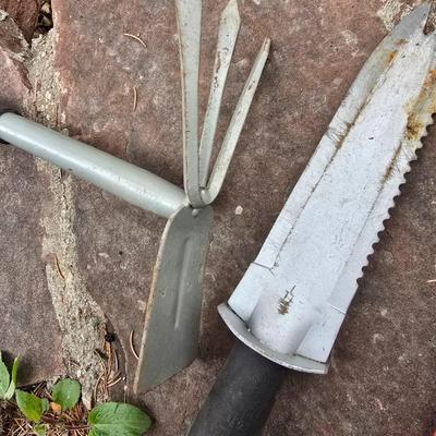 Gardening items - Vegetable seeds in a wire basket - Knee pad - Jars with gardening items - Garden knife - Hand rake and more