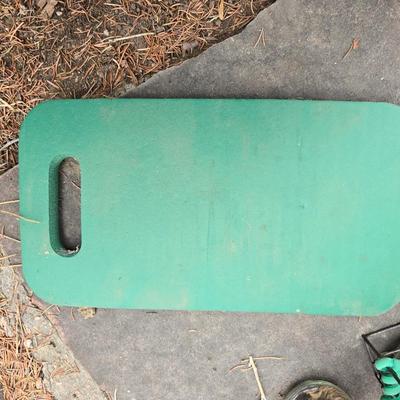 Gardening items - Vegetable seeds in a wire basket - Knee pad - Jars with gardening items - Garden knife - Hand rake and more