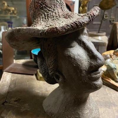 Woman with hat and earrings sculpture, Heavy metal Bronze?