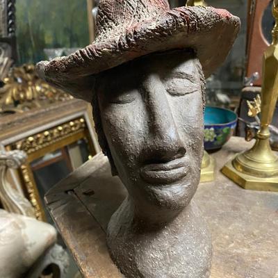 Woman with hat and earrings sculpture, Heavy metal Bronze?