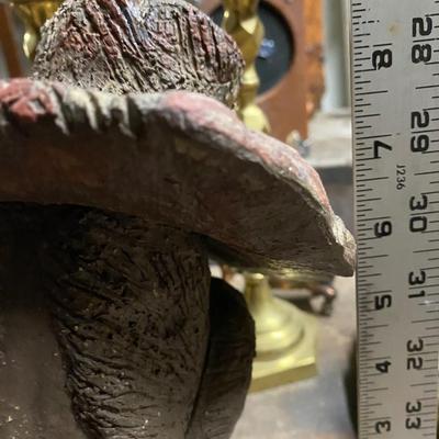 Woman with hat and earrings sculpture, Heavy metal Bronze?