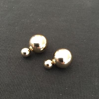Gold toned, double sided earrings