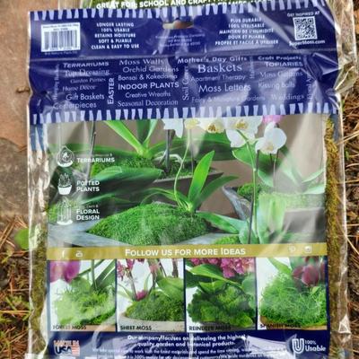 Garden pot with stand - partial bag of rose food - crafting moss - and a unopened bag of Odla hydroponic clay beads