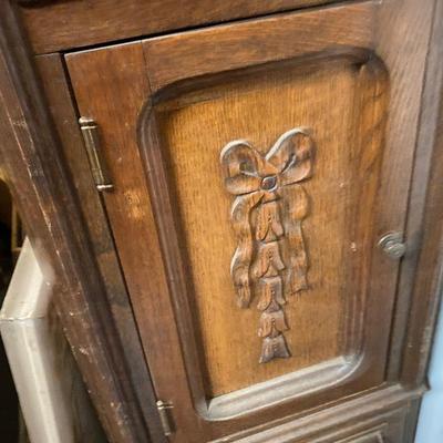 Antique storage cabinet with card catalog drawers