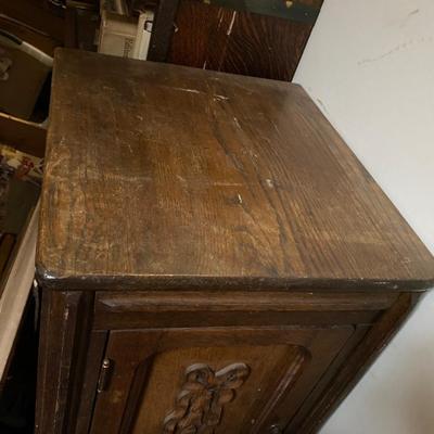 Antique storage cabinet with card catalog drawers
