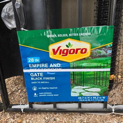 Brand new Vigoro Empire and Westrbrook Garden gate a roll of mesh barrier and a black plastic with handle