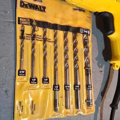 Electric Dewalt 3/8" V.S.R. Drill with case, instruction manual, and a few accessories