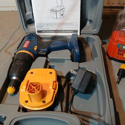 Ryobi cordless drill-driver with case - 2 batteries - charger- Instructions and some accessories 12 volt