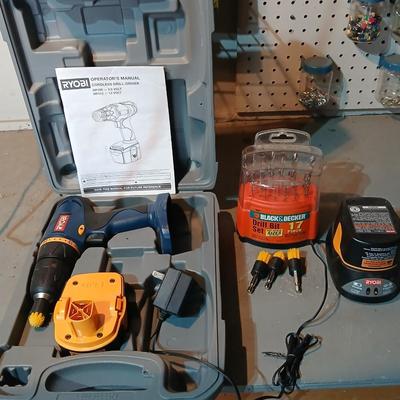 Ryobi cordless drill-driver with case - 2 batteries - charger- Instructions and some accessories 12 volt