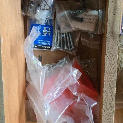Assortment of home hardware - new caster wheels - screws - nails - Large rat traps - new in the bag hardware